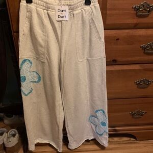 Davi & Dani womens White Joggers with Blue Floral Design